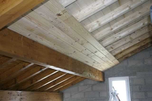 Плюсы и минусы, варианты применения деревянных панелей для потолка и стен
